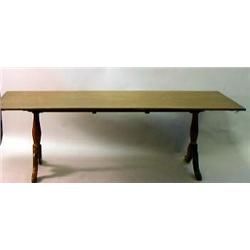 A FRENCH PROVINCIAL STYLE STAINED PINE DINING TABLE