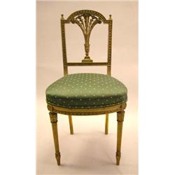 A LOUIS XVI STYLE CARVED GILTWOOD CHAISE