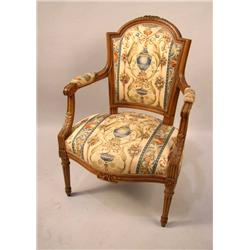 A LOUIS XVI STYLE CARVED BEECHWOOD FAUTEUIL