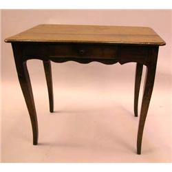 A LOUIS XV PROVINCIAL OAK TABLE