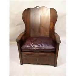 A PAIR OF FACETED OAK EASY CHAIRS