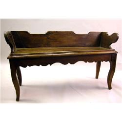 A FRENCH PROVINCIAL STYLE OAK HALL BENCH