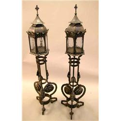 A PAIR OF STEEL AND GLASS LANTERNS