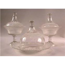 A PAIR OF COLORLESS GLASS FOOTED DIAMOND POINT COMPOTES