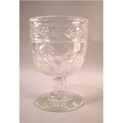 A COLORLESS CUT GLASS FOOTED COMPOTE