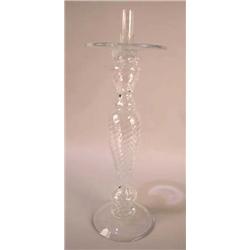 A COLORLESS GLASS CANDLESTAND