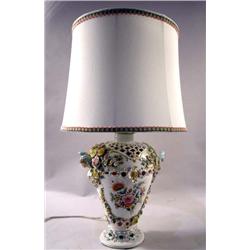 A GERMAN PORCELAIN VASE MOUNTED AS A LAMP