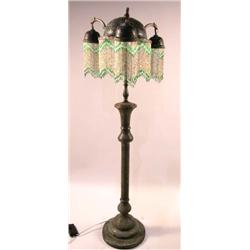A MOORISH STYLE PIERCED BRASS FLOOR LAMP