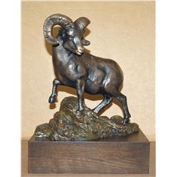 Bronze sculpture depiction of a bighorn sheep ram, entitled, “The Vanishing”, is engraved as “Number