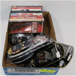 FLAT W/ ASSORTED DVDS AND CABLES