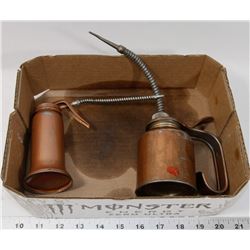 FLAT OF ANTIQUE OIL CANS.