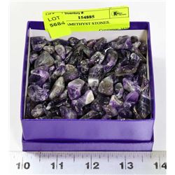 BOX OF AMETHYST STONES.