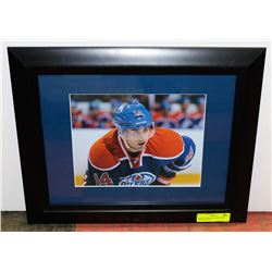 JORDAN EBERLE OILERS SIGNED FRAMED PHOTO.