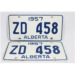 MATCHING SET OF 2 ALBERTA 1957 LICENSE PLATES.