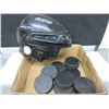 Image 1 : Hockey Helmet and Pucks / helmut is size 7 - 7 1/2 -   56 - 60cm
