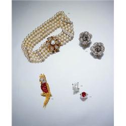 A PAIR OF DIAMOND-SET FLOWER-HEAD EARCLIPS