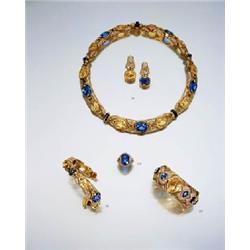 A SAPPHIRE AND DIAMOND-SET RING