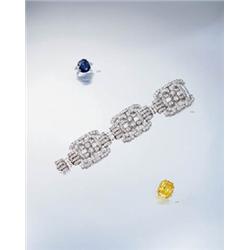 AN IMPRESSIVE TREATED YELLOW DIAMOND RING