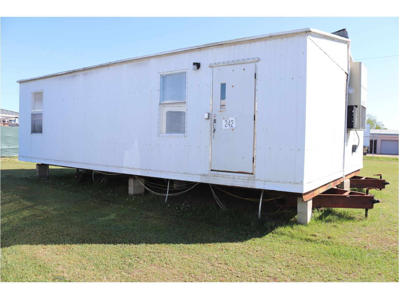 OFFICE TRAILER J.M. Wood Auction Company, Inc.