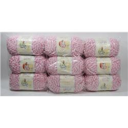 9 ROLLS OF BERNAT PINK/ WHITE BABY BLANKET YARN