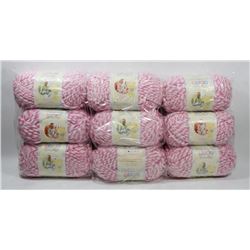 9 ROLLS OF BERNAT PINK/ WHITE BABY BLANKET YARN