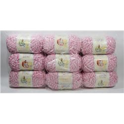 9 ROLLS OF BERNAT PINK/ WHITE BABY BLANKET YARN