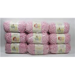 9 ROLLS OF BERNAT PINK/ WHITE BABY BLANKET YARN