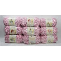 9 ROLLS OF BERNAT PINK/ WHITE BABY BLANKET YARN