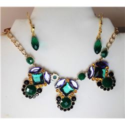17)  GOLD TONE WITH BLACK, TEAL, MAUVE &