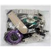 Image 1 : OVER 1LB BAG OF ASSORTED WATCHES.