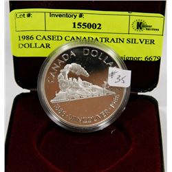 1986 CASED CANADA TRAIN SILVER DOLLAR