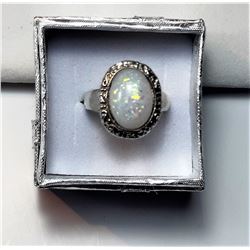 11)  SILVER TONE & WHITE FIRE OPAL RING