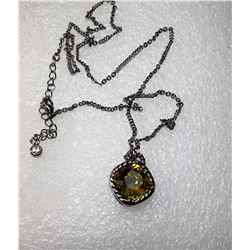 18)  SILVER TONE & PERIDOT COLORED