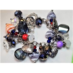 19)  SILVER TONE HEART THEMED BRACELET