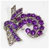 Image 1 : RHINESTONE PURPLE BROOCH.