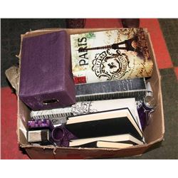 BOX OF PURPLE AND PARIS THEMED DECOR.