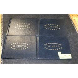 FOUR BLACK LEATHER STYLE GUEST BOOKS.