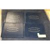Image 1 : FOUR BLACK LEATHER STYLE GUEST BOOKS.