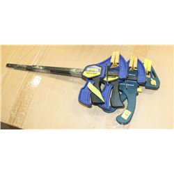 THREE ASSORTED SIZED PLASTIC TABLE CLAMPS.