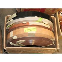 BOX OF PLASTIC EDGING FOR FURNITURE.