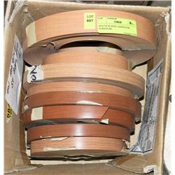 BOX OF PLASTIC EDGING FOR FURNITURE.
