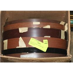 BOX OF PLASTIC EDGING FOR FURNITURE.