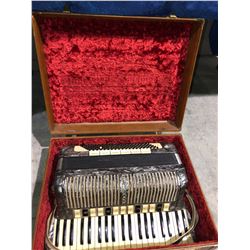 1950's Hohner Accordian in original case polished pearl finish (rare)