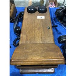 Wall telephone in oak case (great condition)