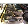 Image 11 : Table of various sports equipment, baseball bats, gloves, Hilltops Football helmet, antique hockey s