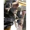 Image 12 : Table of various sports equipment, baseball bats, gloves, Hilltops Football helmet, antique hockey s