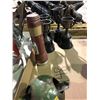 Image 18 : Table of various sports equipment, baseball bats, gloves, Hilltops Football helmet, antique hockey s