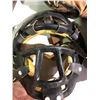Image 6 : Table of various sports equipment, baseball bats, gloves, Hilltops Football helmet, antique hockey s