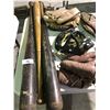Image 9 : Table of various sports equipment, baseball bats, gloves, Hilltops Football helmet, antique hockey s