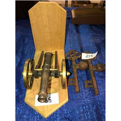 2 antique keys and brass cannon